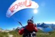 مغامر يقفز فوق قمة جبل بالنرويج من هليكوبتر