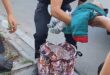 امرأة أوكرانية تضع طفلها فى حقيبة يدها والشرطة توقفها.. صور