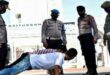 النوم فى تابوت أو تمارين الضغط..عقوبات عدم ارتداء الكمامة بإندونسيا