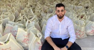فلسطينى يوزع مساعدت على الفقراء بدلا من إقامة حفل زفاف