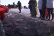 صينيون يصطادون السمك بوسيلة غريبة من تحت الجليد فى تقليد سنوى