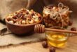 العسل والمكسرات مزيج صحي يعزز الفوائد ويقوي الجسم
